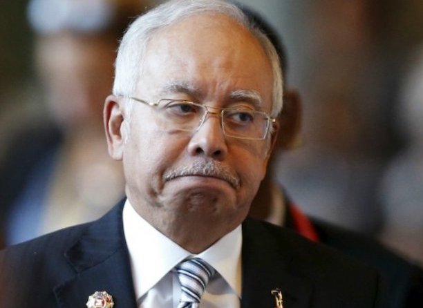Najib Razak and Boris Johnson disagree on how to fight ...